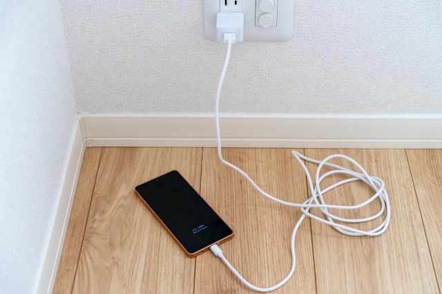 Charging cables stretch at night.